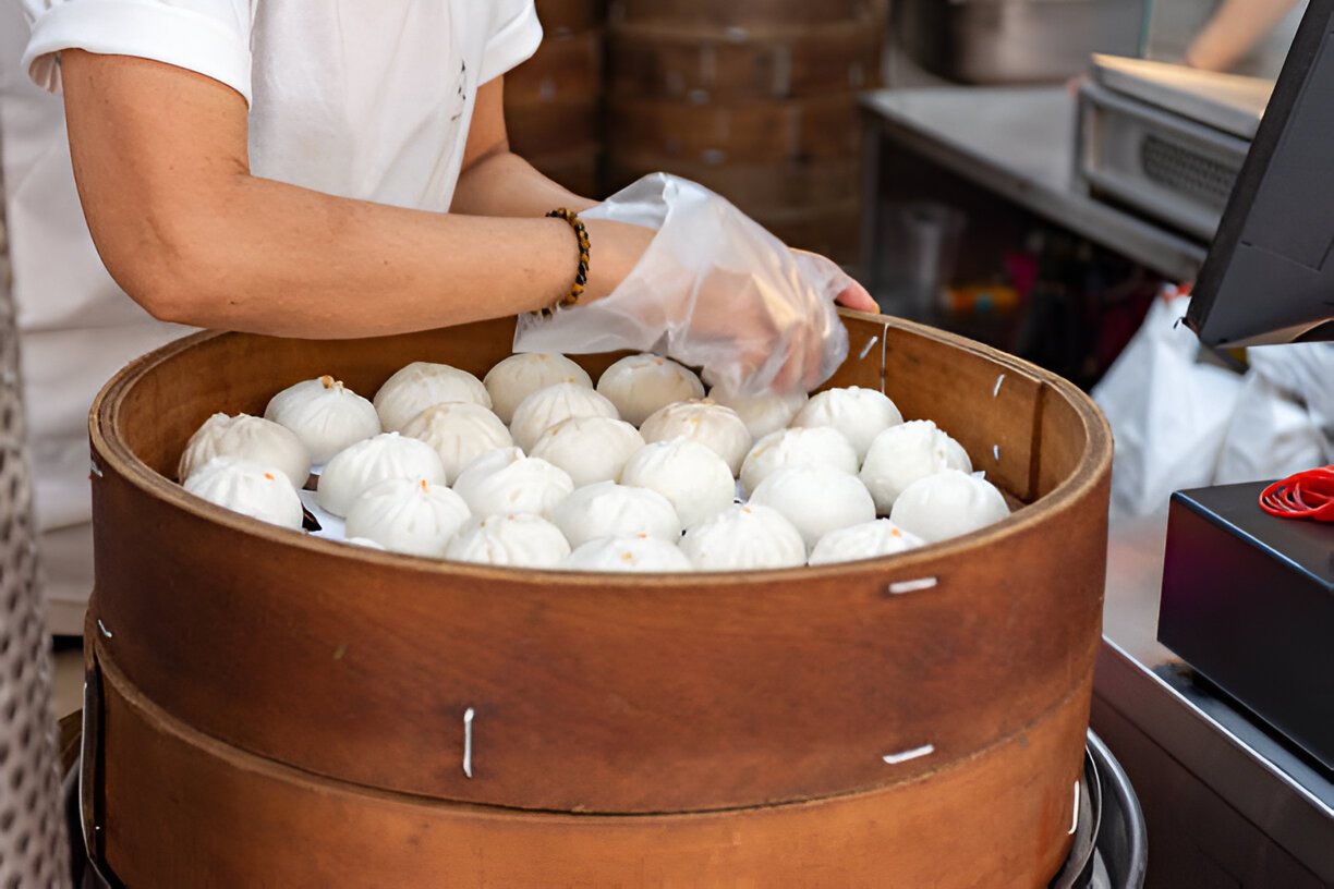 large tray of steamed bread after being baked