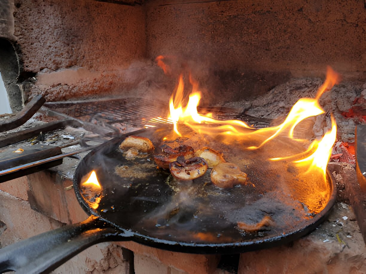 mushrooms in frying pan on fire