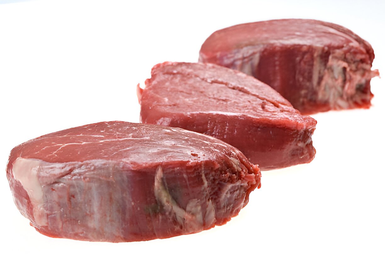 three raw steaks bottom round