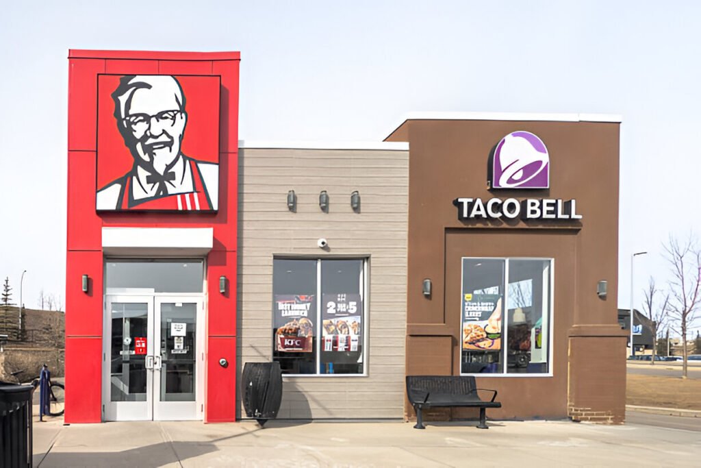 a street level shot of a dual-branded-kfc and taco bell restaurant